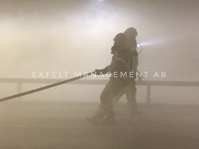 Brandmän i arbete